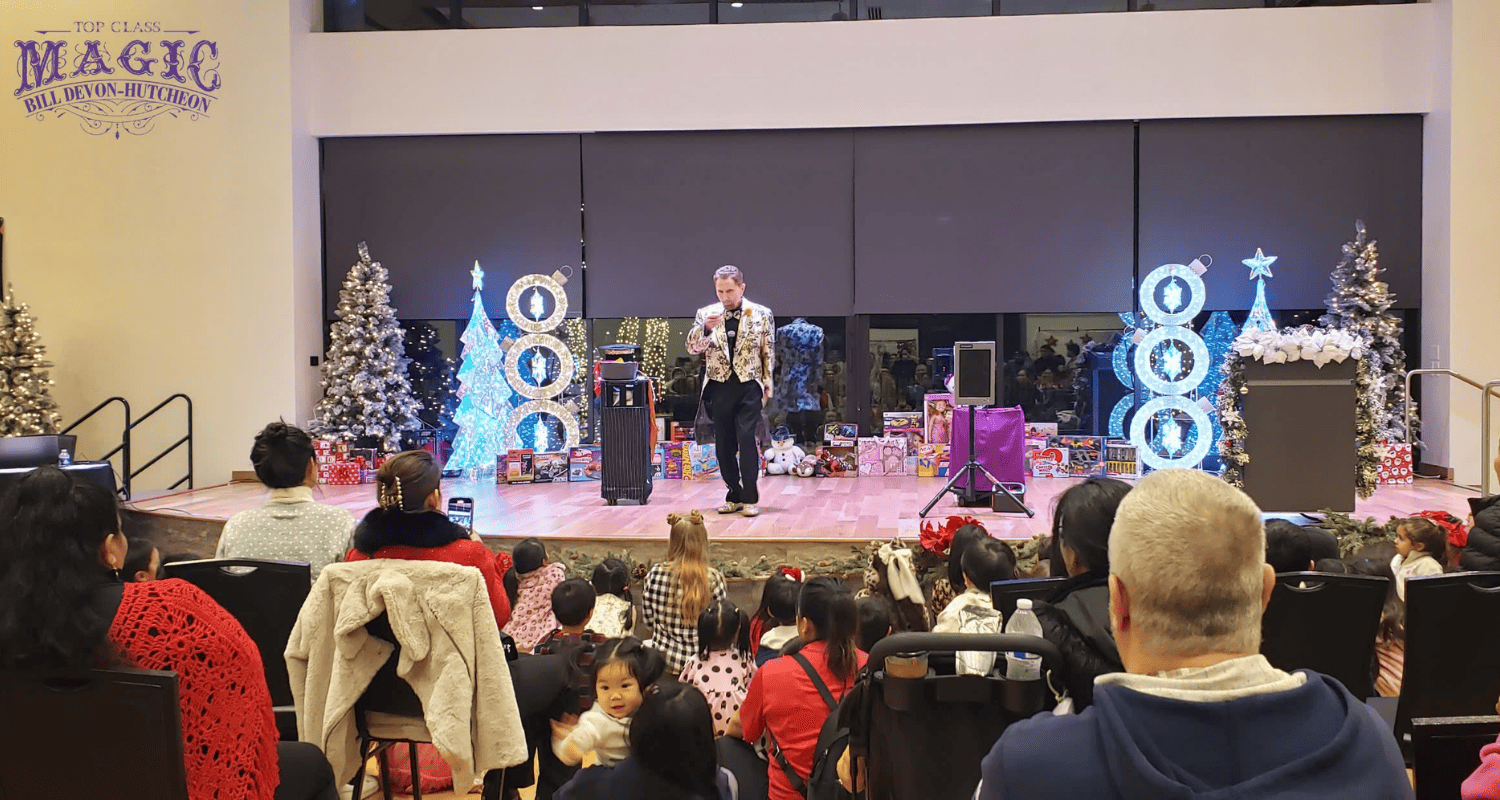 Sacramento magician Bill Devon performing a Christmas magic show for families and children
